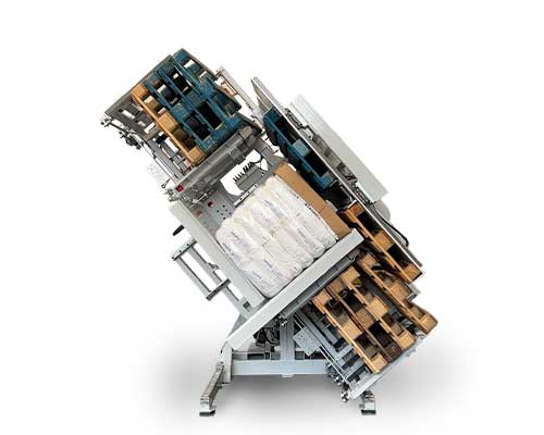 An advanced pallet inverter machine with built-in pallet dispensers for fully automated loading and unloading