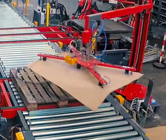 Forklift loading slip sheets onto truck bed