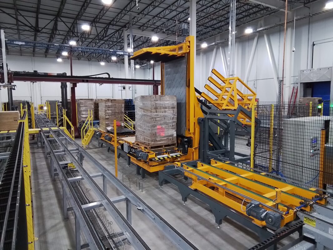 automated pallet inverter in automated warehouse line