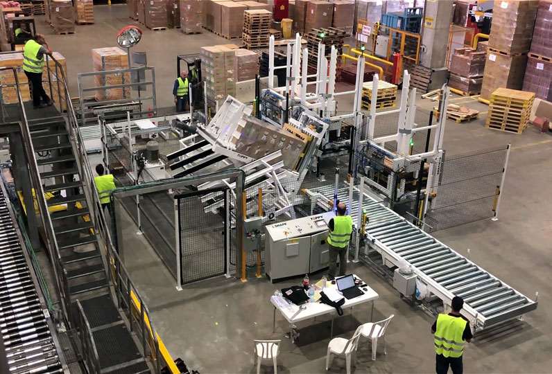 自动化托盘交换系统将木质托盘替换为塑料托盘